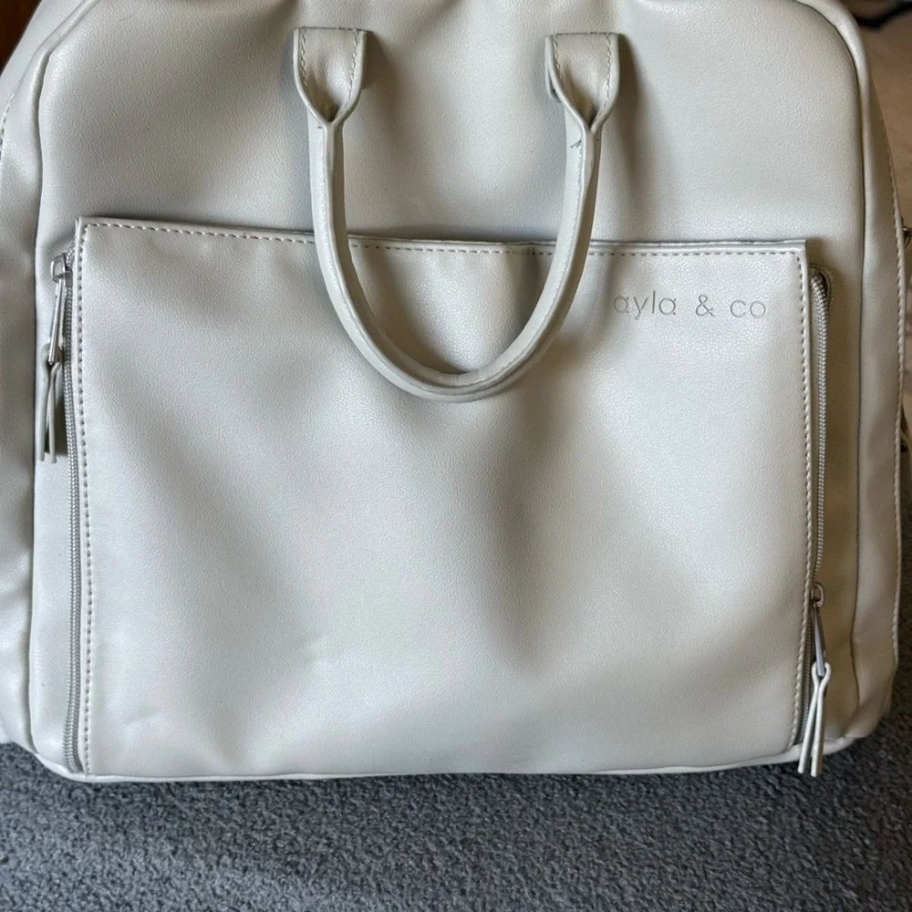 Chic Cream Backpack with Front Pocket